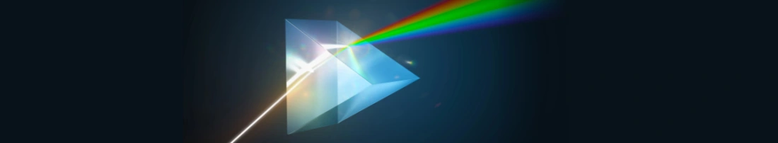 Refracting the light to split it into its spectral colors.